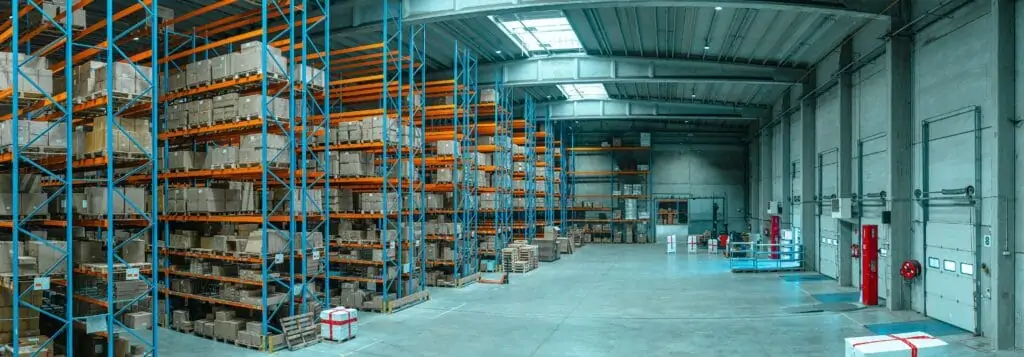 supply chain warehouse with shelves of boxes