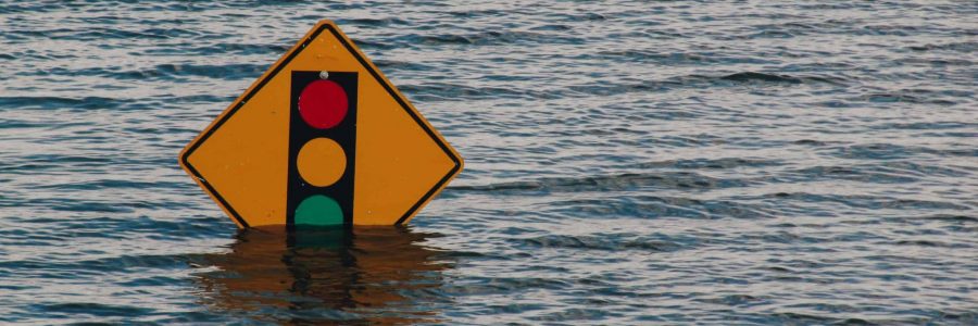 traffic sign under flood water